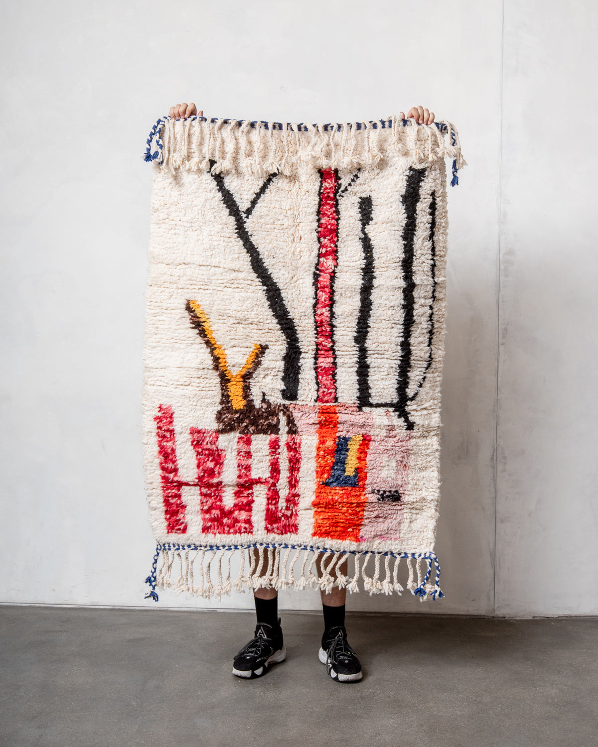 Modern, designer, handcrafted Berber rug from Morocco. Beniourain carpet with beautiful colours and patterns and fluffy wool texture.